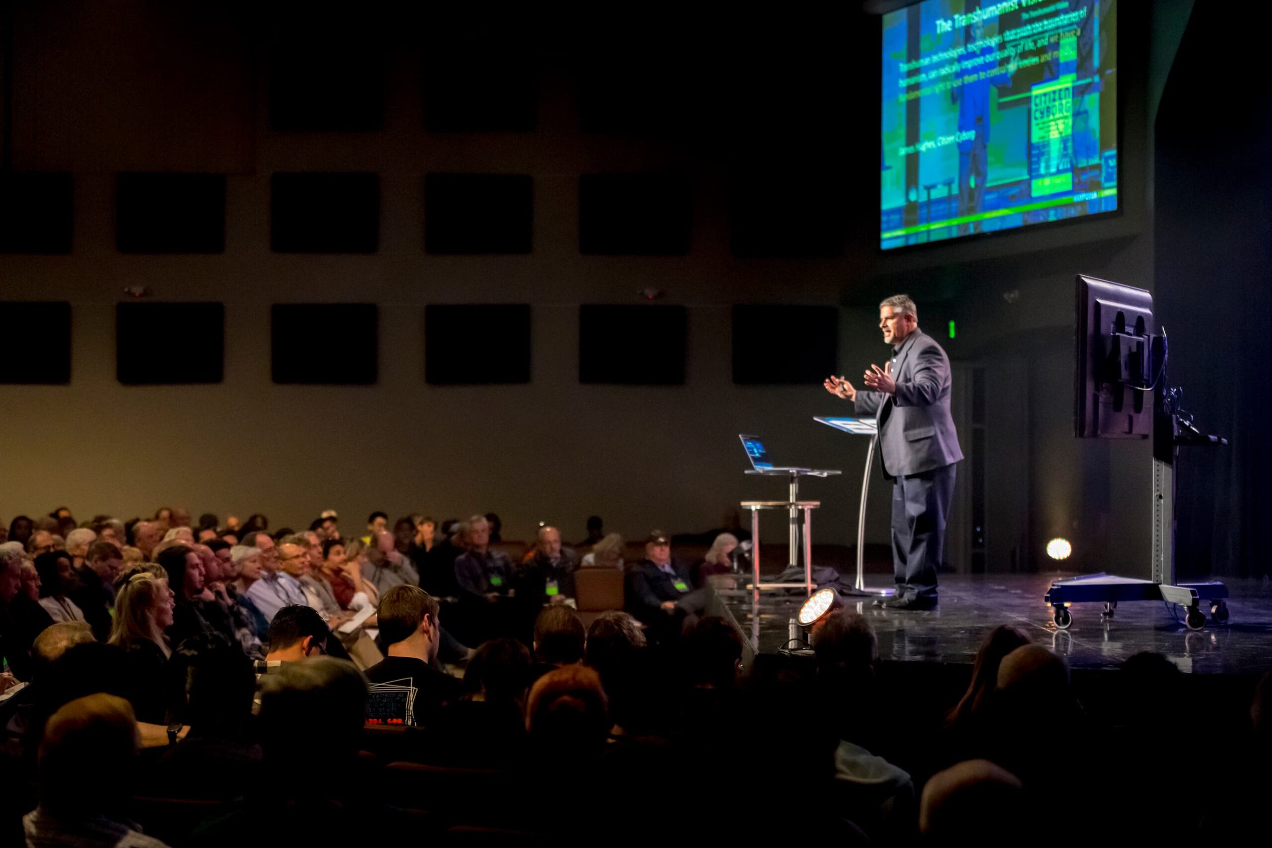 Dr. Fuz Rana presenting at a church